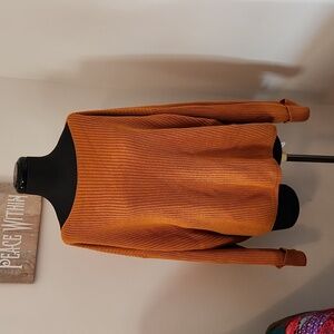 Mustard colored knitted sweater